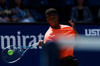 Aug 26, 2025; Flushing, NY, USA; Giovanni Mpetshi Perricard (FRA) hits the ball to Lorenzo Musetti (ITA)(not pictured) on day three of the 2025 U.S. Open tennis tournament at the USTA Billie Jean King National Tennis Center at Billie Jean King National Tennis Center. Mandatory Credit: Amber Searls-Imagn Images