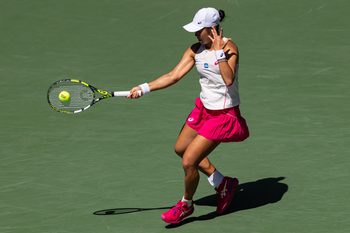 Aug 27, 2025; Flushing, NY, USA; Janice Tjen of Indonesia in action against Emma Raducanu of United Kingdom in the second round of the womenís singles at the US Open at Louis Armstrong Stadium in Billie Jean King National Tennis Center. Mandatory Credit: Mike Frey-Imagn Images
