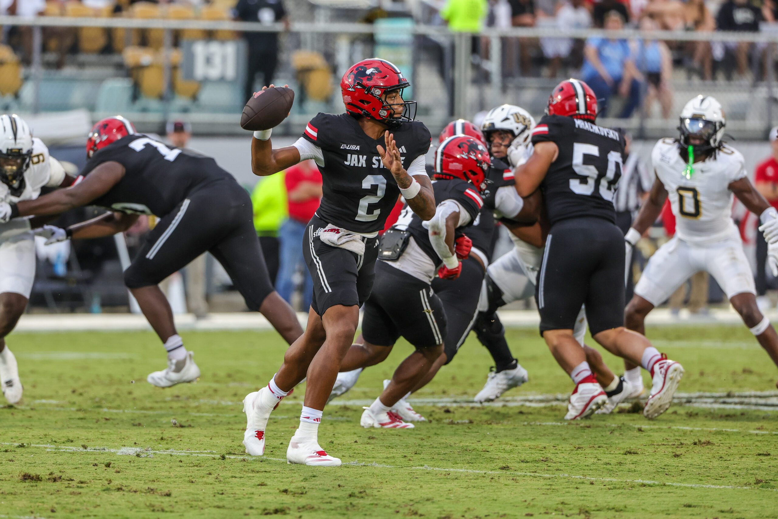 Aug 28, 2025; Orlando, Florida, USA; Jacksonville State Gamecocks quarterback Gavin Wimsatt (2) passes the ball during the first quarter against the UCF Knights at Acrisure Bounce House. Mandatory Credit: Mike Watters-Imagn Images