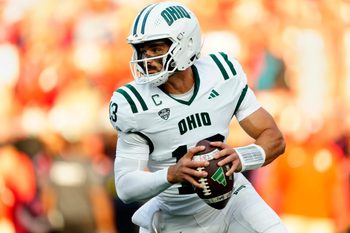 Ohio Bobcats quarterback Parker Navarro (13) looks for an open teammate, Thursday, August 28, 2025.
