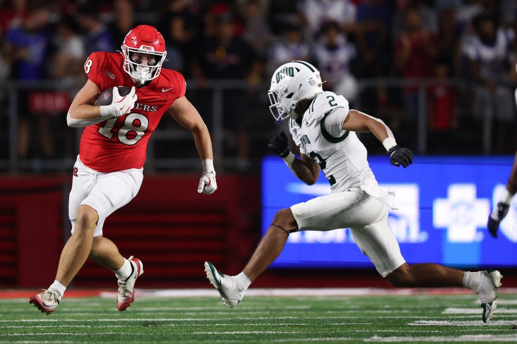 Aug 28, 2025; Piscataway, New Jersey, USA; Rutgers Scarlet Knights tight end Colin Weber (18) gains yards after catch as Ohio Bobcats safety DJ Walker (2) pursues during the second half at SHI Stadium. Mandatory Credit: Vincent Carchietta-Imagn Images