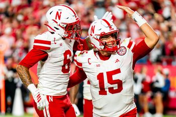 Aug 28, 2025; Kansas City, Missouri, USA; Nebraska Cornhuskers quarterback Dylan Raiola (15) celebrates with wide receiver Dane Key (6) after a touchdown against the Cincinnati Bearcats during the fourth quarter at GEHA Field at Arrowhead Stadium. Mandatory Credit: Dylan Widger-Imagn Images