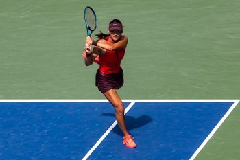 Aug 29, 2025; Flushing, NY, USA; Emma Raducanu of United Kingdom in action against Elena Rybakina of Kazakhstan in the third round of the womenís singles at the US Open at Louis Armstrong Stadium in Billie Jean King National Tennis Center. Mandatory Credit: Mike Frey-Imagn Images