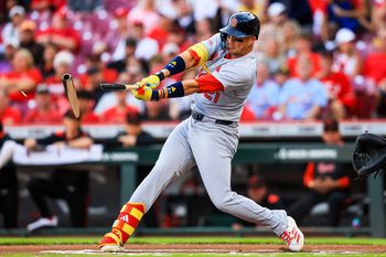 Aug 29, 2025; Cincinnati, Ohio, USA; St. Louis Cardinals outfielder Lars Nootbaar (21) breaks his bat on a pitch in the first inning against the Cincinnati Reds at Great American Ball Park. Mandatory Credit: Katie Stratman-Imagn Images