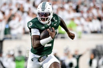 Michigan State's Aidan Chiles runs for a gain against Western Michigan during the second quarter on Friday, Aug. 29, 2025, in East Lansing.