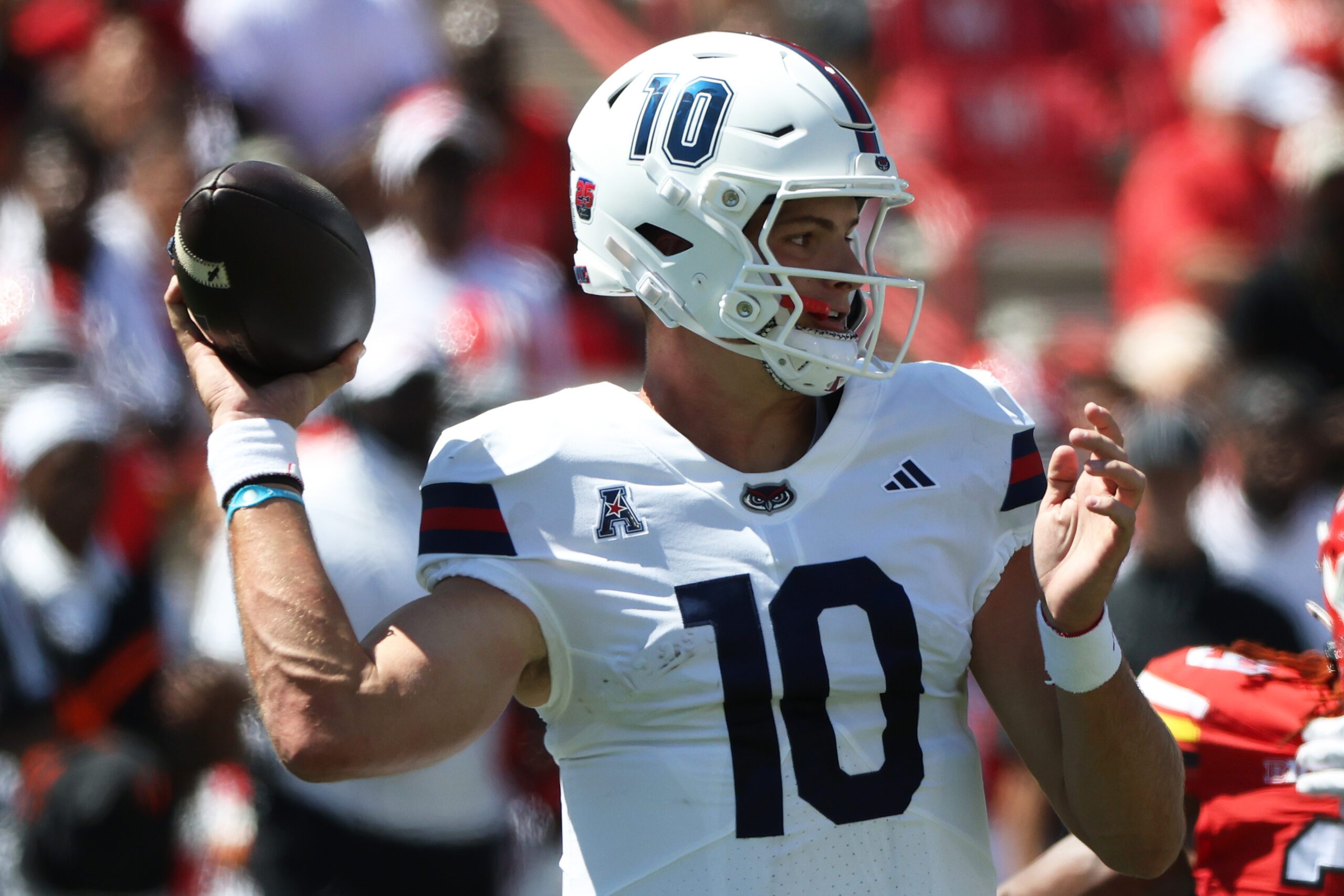 Aug 30, 2025; College Park, Maryland, USA; Florida Atlantic Owls quarterback Caden Veltkamp (10) throws during the first half against the Maryland Terrapins at SECU Stadium. Mandatory Credit: Daniel Kucin Jr.-Imagn Images