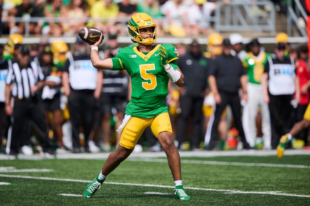 Aug 30, 2025; Eugene, Oregon, USA; Oregon Ducks quarterback Dante Moore (5) throws the football during the second half against the Montana State Bobcats at Autzen Stadium. Mandatory Credit: Troy Wayrynen-Imagn Images