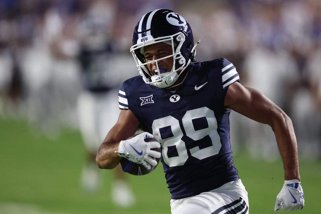Aug 30, 2025; Provo, Utah, USA; Brigham Young Cougars wide receiver Dominique McKenzie (89) reacts to scoring a touchdown against the Portland State Vikings during the fourth quarter at LaVell Edwards Stadium. Mandatory Credit: Rob Gray-Imagn Images