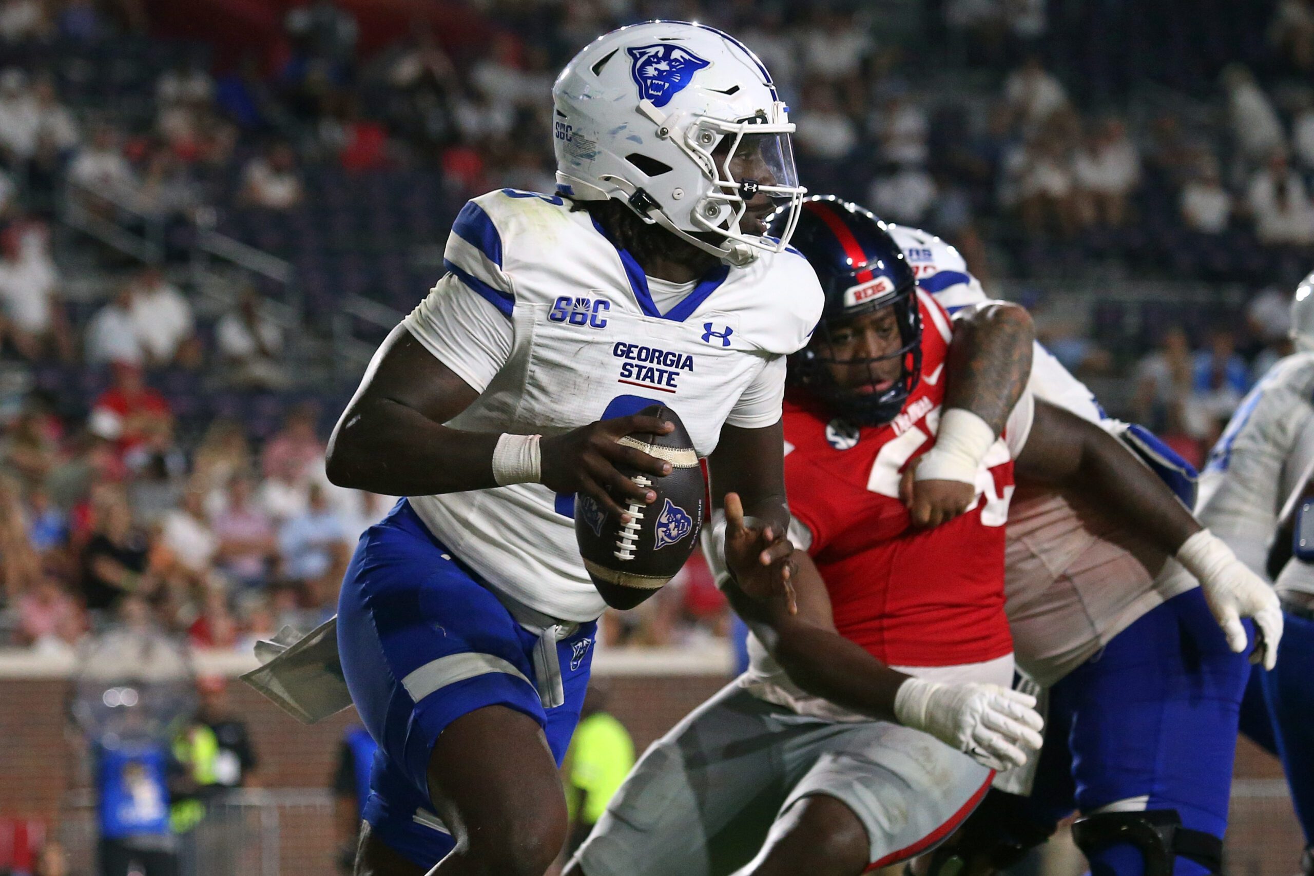 Aug 30, 2025; Oxford, Mississippi, USA; Georgia State Panthers quarterback Cameran Brown (8) scrambles during the fourth quarter against the Mississippi Rebels at Vaught-Hemingway Stadium. Mandatory Credit: Petre Thomas-Imagn Images