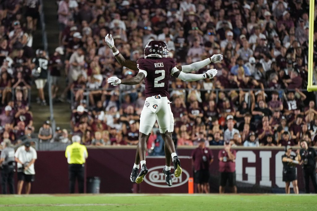 Aug 30, 2025; College Station, Texas, USA; Texas A&M Aggies cornerback Dezz Ricks (2) celebrates during the second half against the UTSA Roadrunners at Kyle Field. Mandatory Credit: Sean Thomas-Imagn Images