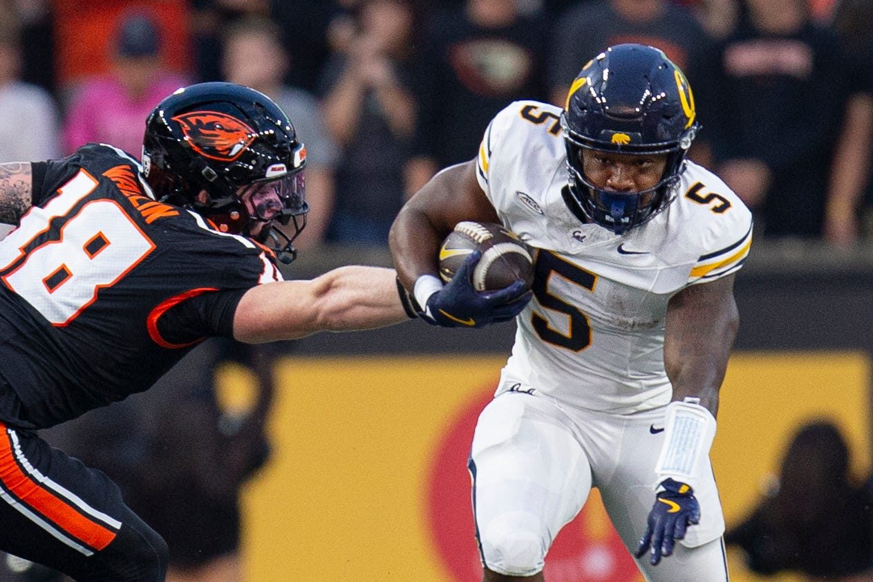 CaliforniaÕs Brandon High Jr. breaks the tackle from Oregon StateÕs Kai Wallin during an NCAA football game at Reser Stadium on Saturday, Aug. 30, 2025, in Corvallis, Ore.