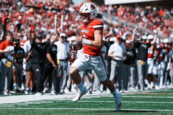 Louisville Cardinals quarterback Miller Moss (7) scores on this touchdown run in the first quarter during the Cards' 51-17 win over Eastern Kentucky University at the Cardinals' season opener Saturday, August 30, 2025 at L&N Federal Credit Union Stadium in Louisville, Kentucky.