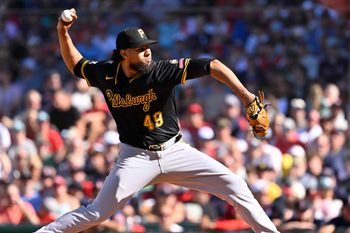 Aug 31, 2025; Boston, Massachusetts, USA; Pittsburgh Pirates relief pitcher Yohan Ramírez (49) pitches against the Boston Red Sox during the eighth inning at Fenway Park. Mandatory Credit: Eric Canha-Imagn Images
