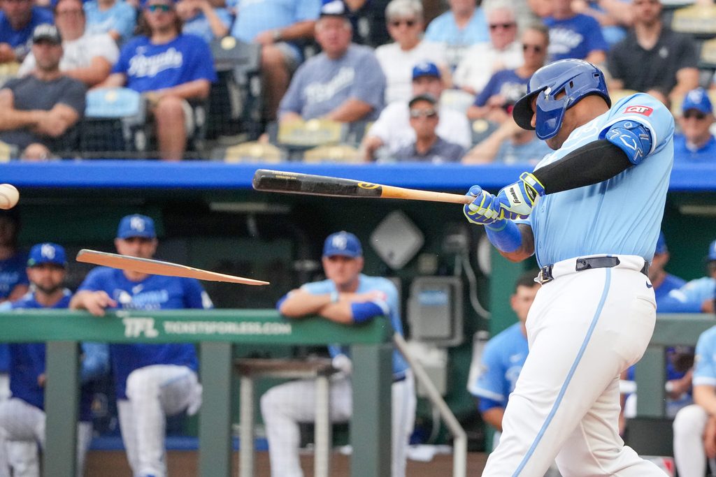 Aug 31, 2025; Kansas City, Missouri, USA; Kansas City Royals designated hitter Salvador Perez (13) breaks his bat hitting a single against the Detroit Tigers during the ninth inning at Kauffman Stadium. Mandatory Credit: Denny Medley-Imagn Images