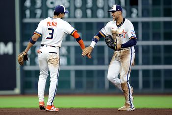 Sep 1, 2025; Houston, Texas, USA; Houston Astros right fielder Cam Smith (11) is congratulated by Houston Astros shortstop Jeremy Pena (3) after the final out against the Los Angeles Angels during the ninth inning at Daikin Park. Mandatory Credit: Erik Williams-Imagn Images