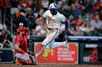 Sep 1, 2025; Houston, Texas, USA; Houston Astros right fielder Cam Smith (11) crosses home plate to score a run  against the Los Angeles Angels during the eighth inning at Daikin Park. Mandatory Credit: Erik Williams-Imagn Images