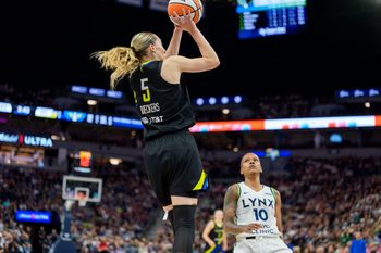 Sep 1, 2025; Minneapolis, Minnesota, USA; Dallas Wings guard Paige Bueckers (5) shoots over Minnesota Lynx guard Courtney Williams (10) in the third quarter at Target Center. Mandatory Credit: Matt Blewett-Imagn Images
