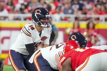Aug 22, 2025; Kansas City, Missouri, USA; Chicago Bears quarterback Caleb Williams (18) goes under center against the Kansas City Chiefs during the game at GEHA Field at Arrowhead Stadium. Mandatory Credit: Denny Medley-Imagn Images
