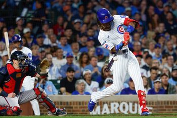 Sep 5, 2025; Chicago, Illinois, USA; Chicago Cubs center fielder Kevin Alcantara (13) singles against the Atlanta Braves during the third inning at Wrigley Field. Mandatory Credit: Kamil Krzaczynski-Imagn Images