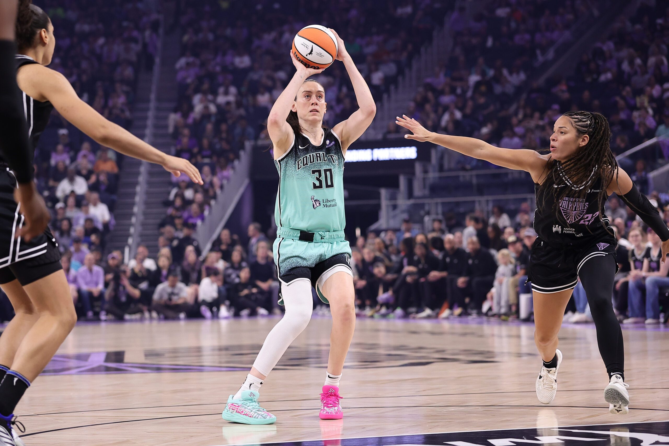 Sep 2, 2025; San Francisco, California, USA; New York Liberty forward Breanna Stewart (30) shoots the ball against Golden State Valkyries guard Veronica Burton (22) during the first quarter at Chase Center. Mandatory Credit: Kelley L Cox-Imagn Images