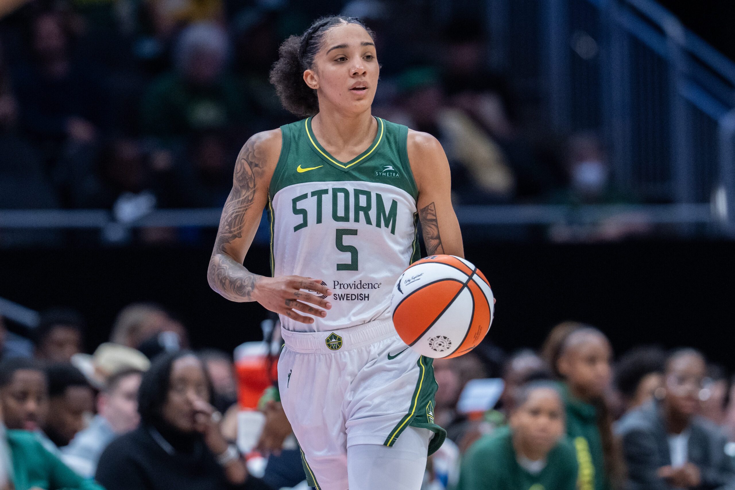 Aug 30, 2025; Seattle, Washington, USA; Seattle Storm forward Gabby Williams (5) dribbles the ball against the Chicago Sky at Climate Pledge Arena. Mandatory Credit: Stephen Brashear-Imagn Images