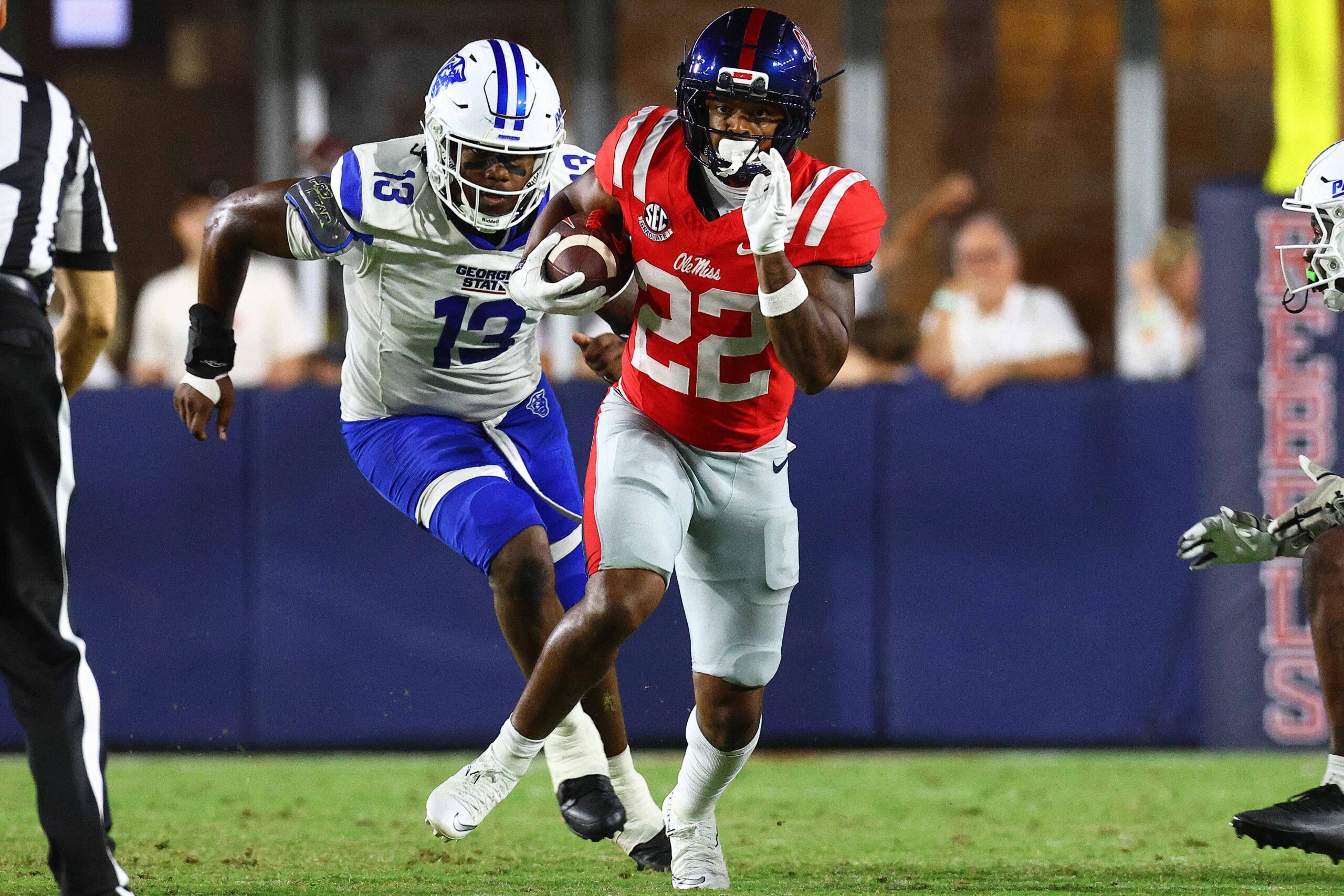 Aug 30, 2025; Oxford, Mississippi, USA; Mississippi Rebels running back Logan Diggs (22) runs the ball during the fourth quarter against the Georgia State Panthers at Vaught-Hemingway Stadium. Mandatory Credit: Petre Thomas-Imagn Images