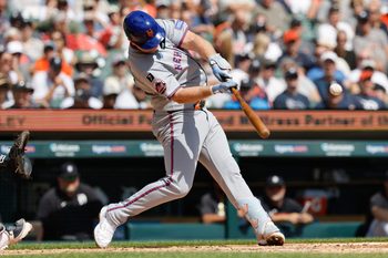 Sep 3, 2025; Detroit, Michigan, USA;  New York Mets player Pete Alonso (20) hits an RBI double in the third inning against the Detroit Tigers at Comerica Park. Mandatory Credit: Rick Osentoski-Imagn Images
