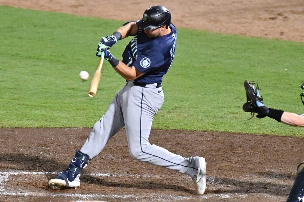 Sep 3, 2025; St. Petersburg, Florida, USA; Seattle Mariners designated hitter Cal Raleigh (29) hits a RBI single in the sixth inning against the Tampa Bay Rays at George M. Steinbrenner Field. Mandatory Credit: Jonathan Dyer-Imagn Images