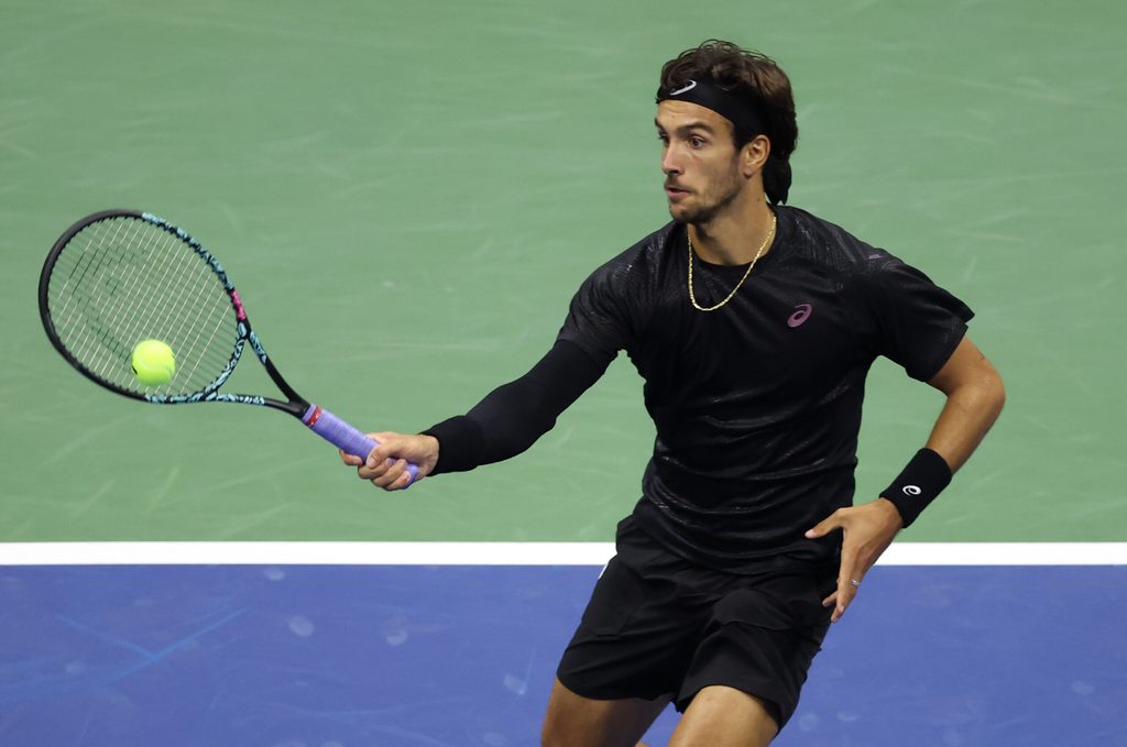 Sep 3, 2025; Flushing, NY, USA; Lorenzo Musetti (ITA) hits a shot against Jannik Sinner (ITA) (not pictured) on day eleven of the 2025 US Open tennis championships at USTA Billie Jean King National Tennis Center. Mandatory Credit: Mike Frey-Imagn Images