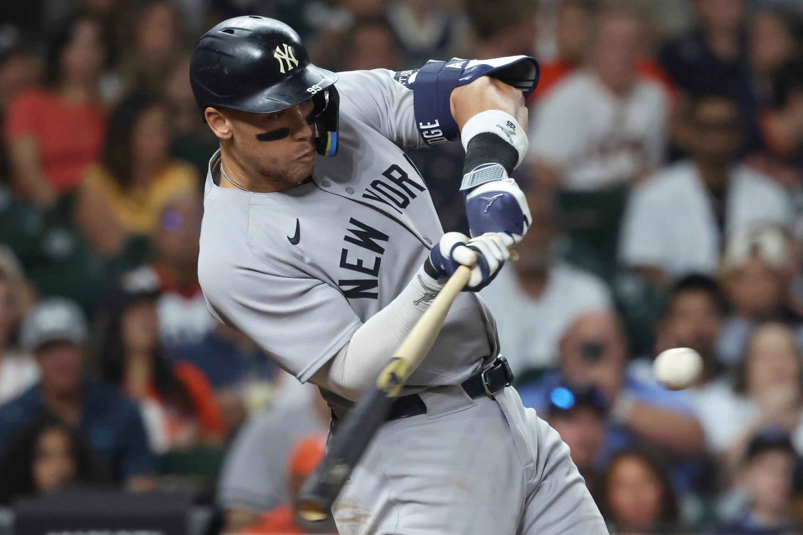 Sep 3, 2025; Houston, Texas, USA; New York Yankees designated hitter Aaron Judge (99) bats during the seventh inning against the Houston Astros at Daikin Park. Mandatory Credit: Troy Taormina-Imagn Images