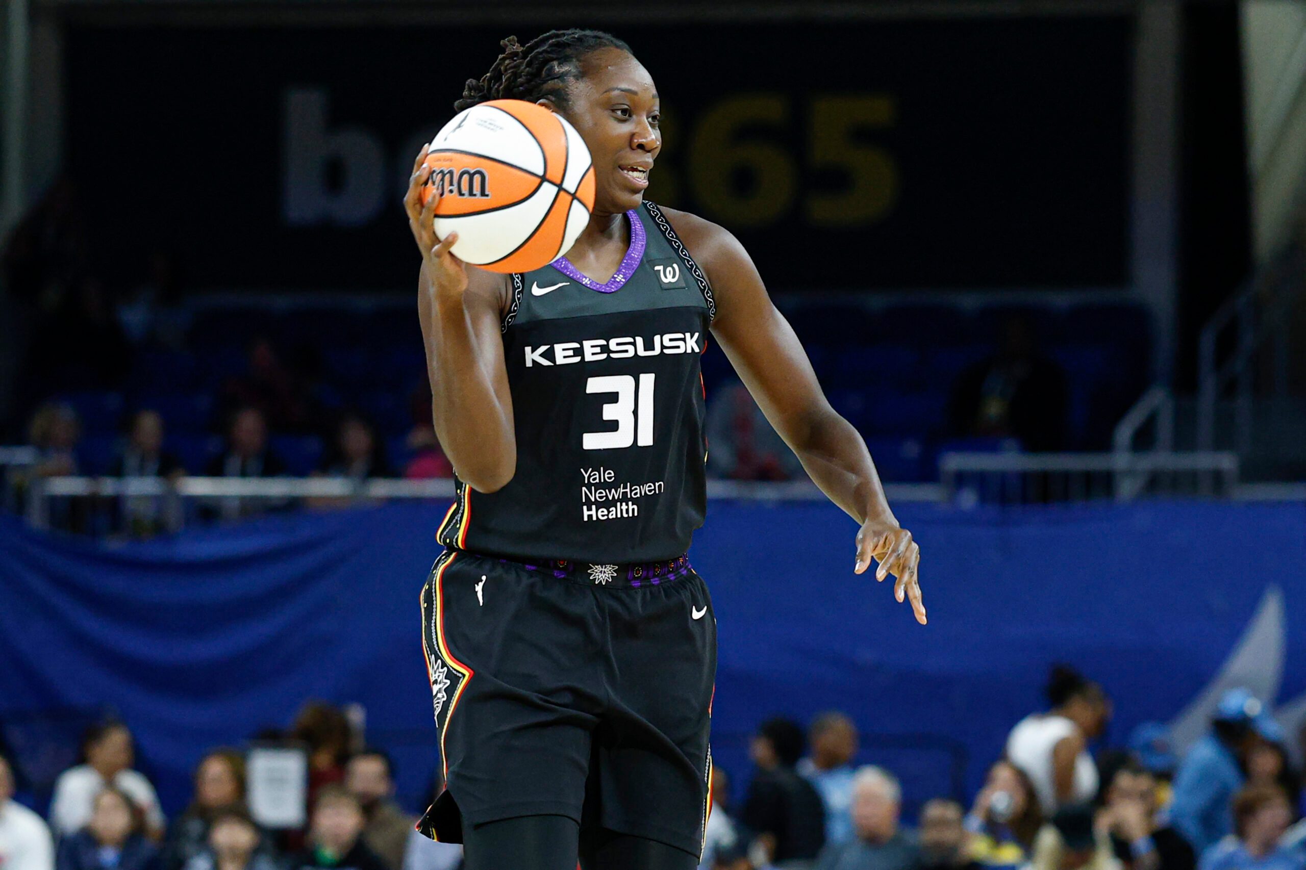 Sep 3, 2025; Chicago, Illinois, USA; Connecticut Sun center Tina Charles (31) looks to pass the ball against the Chicago Sky during the first half at Wintrust Arena. Mandatory Credit: Kamil Krzaczynski-Imagn Images