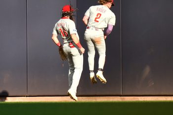 Philadelphia Phillies left fielder Brandon Marsh (16) and Philadelphia Phillies center fielder Harrison Bader (2) celebrate the catch after Milwaukee Brewers second base Andruw Monasterio (14) flies out sharply to center field during the ninth inning of the game on Thursday September 4, 2025 at American Family Field in Milwaukee, Wisconsin.