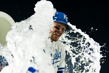 Sep 4, 2025; Kansas City, Missouri, USA; Kansas City Royals shortstop Bobby Witt Jr. (7) is doused by center fielder Kyle Isbel (28) and second baseman Tyler Tolbert (2) after defeating the Los Angeles Angels at Kauffman Stadium. Mandatory Credit: Jay Biggerstaff-Imagn Images