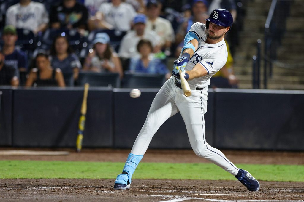 Sep 4, 2025; Tampa, Florida, USA; Tampa Bay Rays outfielder Josh Lowe (15) hits into a fielders choice rbi against the Cleveland Guardians in the sixth inning at George M. Steinbrenner Field. Mandatory Credit: Nathan Ray Seebeck-Imagn Images