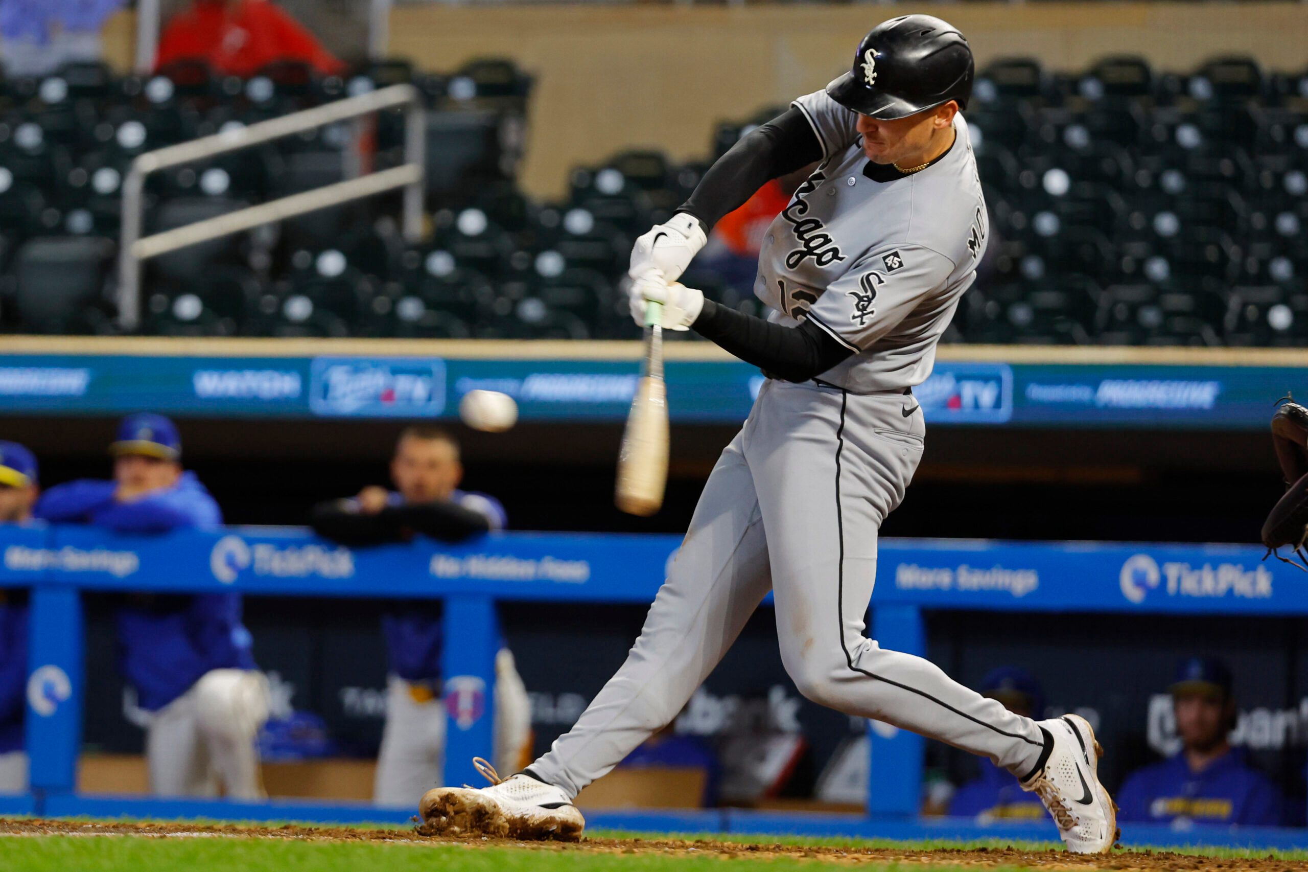 Sep 4, 2025; Minneapolis, Minnesota, USA; Chicago White Sox shortstop Colson Montgomery (12) hits a two-run home run against the Minnesota Twins in the ninth inning at Target Field. Mandatory Credit: Bruce Kluckhohn-Imagn Images