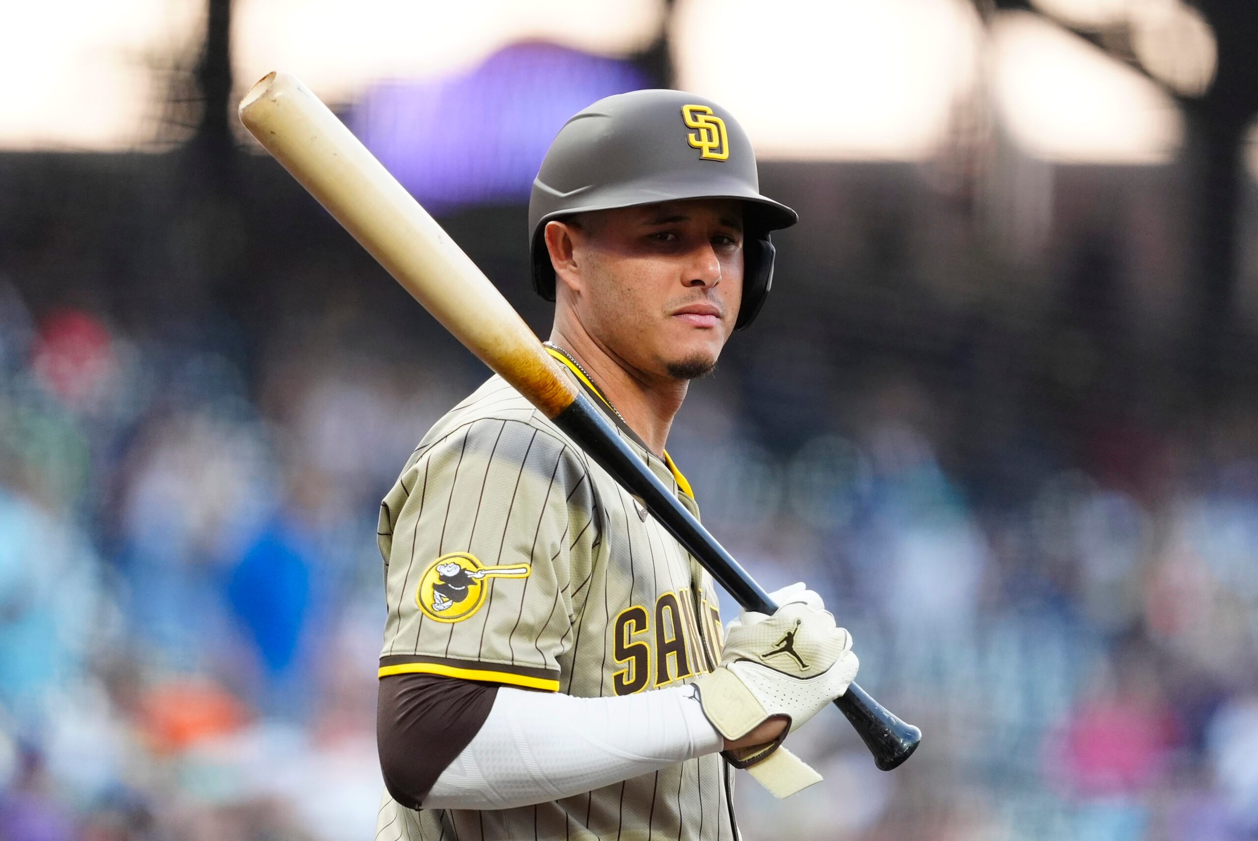 Sep 5, 2025; Denver, Colorado, USA; San Diego Padres third baseman Manny Machado (13) during the first inning against the Colorado Rockies at Coors Field. Mandatory Credit: Ron Chenoy-Imagn Images