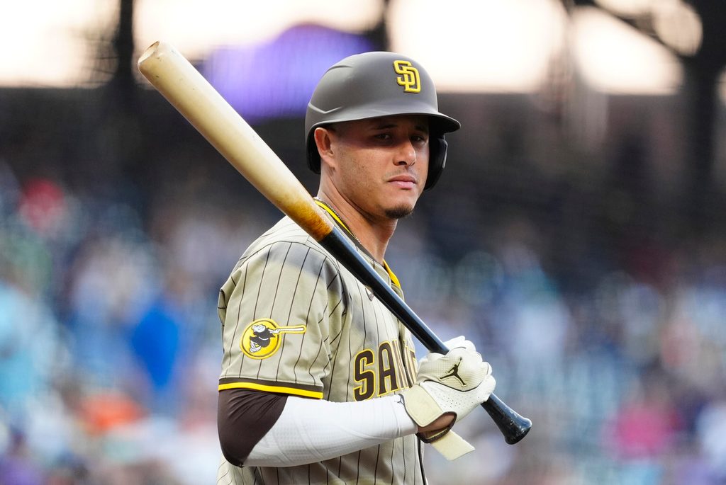 Sep 5, 2025; Denver, Colorado, USA; San Diego Padres third baseman Manny Machado (13) during the first inning against the Colorado Rockies at Coors Field. Mandatory Credit: Ron Chenoy-Imagn Images