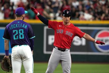 Sep 5, 2025; Phoenix, Arizona, USA; Boston Red Sox outfielder Rob Refsnyder (30) reacts after hitting an RBI double against the Arizona Diamondbacks in the eighth inning at Chase Field. Mandatory Credit: Rick Scuteri-Imagn Images