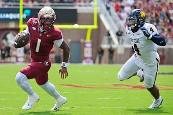 Sep 6, 2025; Tallahassee, Florida, USA; Florida State Seminoles quarterback Tommy Castellanos (1) runs the ball during the first half against the East Texas A&M Lions at Doak S. Campbell Stadium. Mandatory Credit: Melina Myers-Imagn Images