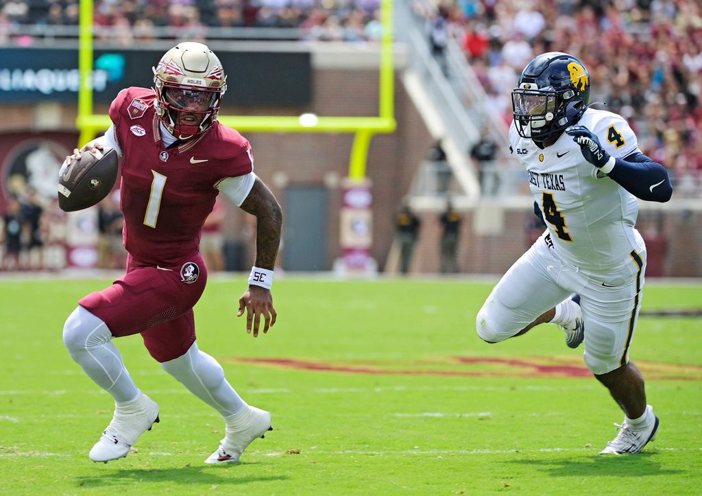Sep 6, 2025; Tallahassee, Florida, USA; Florida State Seminoles quarterback Tommy Castellanos (1) runs the ball during the first half against the East Texas A&M Lions at Doak S. Campbell Stadium. Mandatory Credit: Melina Myers-Imagn Images