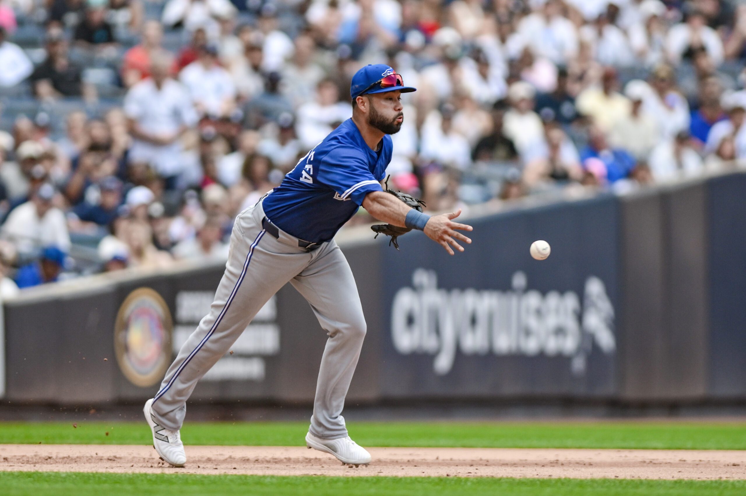 Sep 6, 2025; Bronx, New York, USA; Toronto Blue Jays shortstop Bo Bichette (11) tosses the ball to second base to get a force out against New York Yankees first baseman Ben Rice (not pictured) during the fifth inning at Yankee Stadium. Mandatory Credit: John Jones-Imagn Images