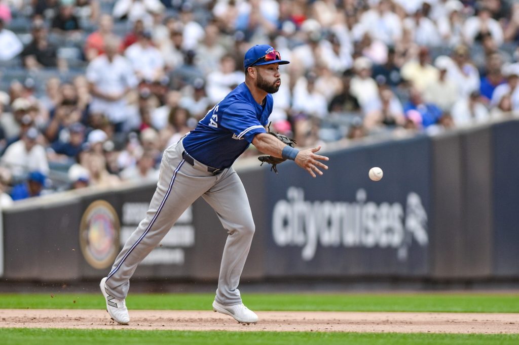 Sep 6, 2025; Bronx, New York, USA; Toronto Blue Jays shortstop Bo Bichette (11) tosses the ball to second base to get a force out against New York Yankees first baseman Ben Rice (not pictured) during the fifth inning at Yankee Stadium. Mandatory Credit: John Jones-Imagn Images