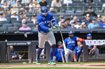 Sep 6, 2025; Bronx, New York, USA; Toronto Blue Jays outfielder George Springer (4) reacts after flying out against the New York Yankees during the fourth inning at Yankee Stadium. Mandatory Credit: John Jones-Imagn Images