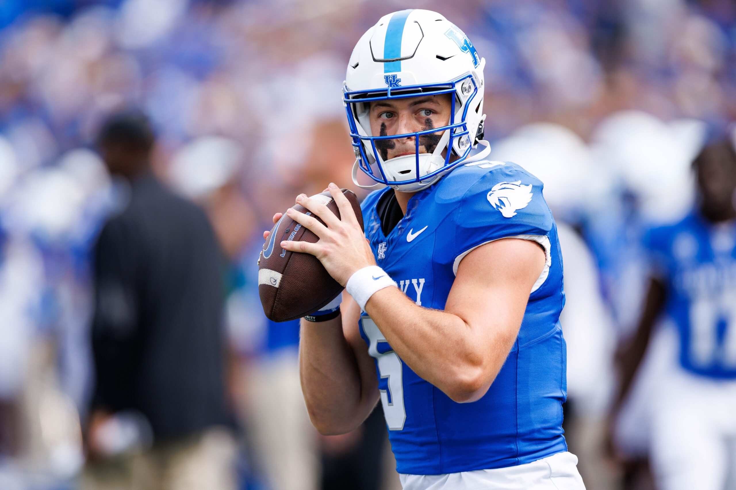 Sep 6, 2025; Lexington, Kentucky, USA; Kentucky Wildcats quarterback Zach Calzada (5) warms up before the game against the Mississippi Rebels at Kroger Field. Mandatory Credit: Jordan Prather-Imagn Images