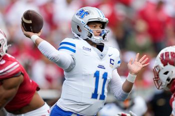 Sep 6, 2025; Madison, Wisconsin, USA; Middle Tennessee Blue Raiders quarterback Nicholas Vattiato (11) throws a pass during the first quarter against the Wisconsin Badgers at Camp Randall Stadium. Mandatory Credit: Kayla Wolf-Imagn Images
