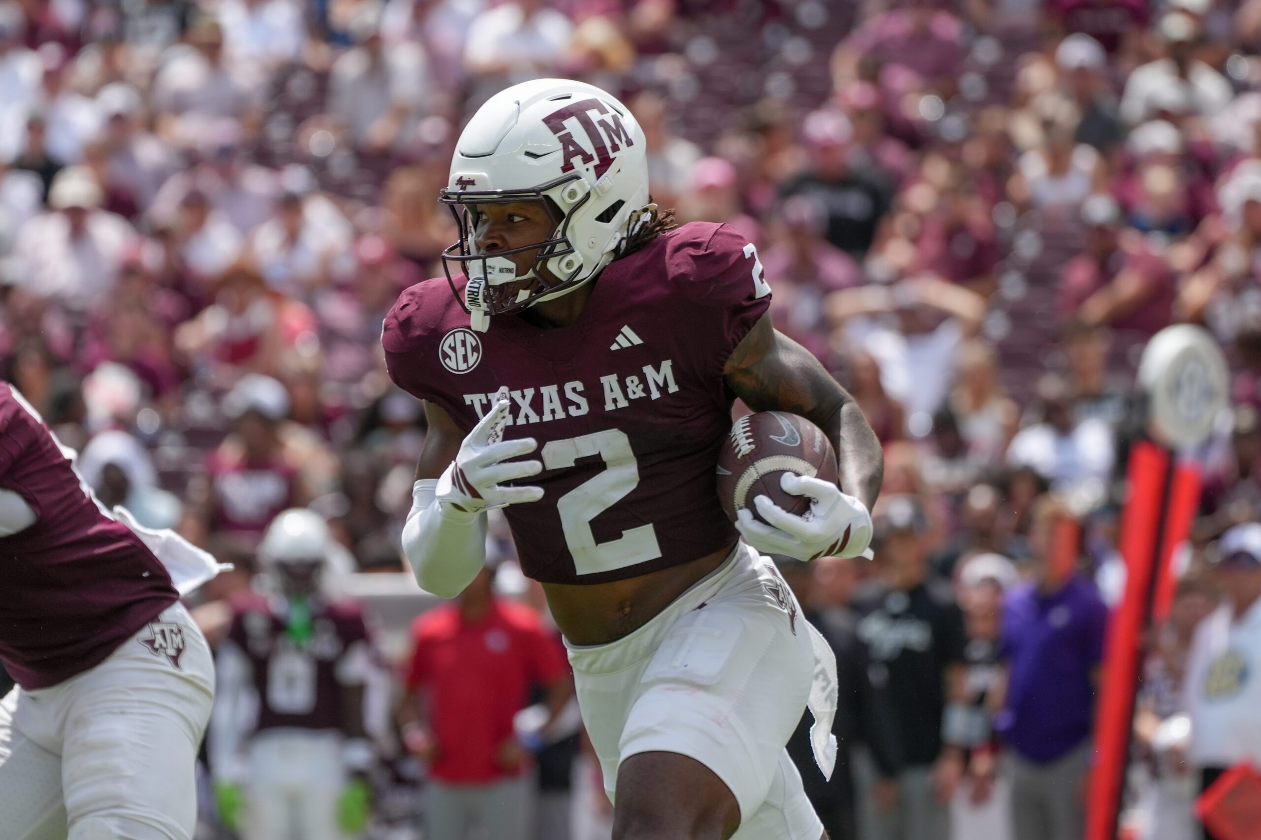 Sep 6, 2025; College Station, Texas, USA; Texas A&M Aggies wide receiver Terry Bussey (2) runs with the football during the second half against the Utah State Aggies at Kyle Field. Mandatory Credit: Sean Thomas-Imagn Images