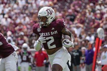 Sep 6, 2025; College Station, Texas, USA; Texas A&M Aggies wide receiver Terry Bussey (2) runs with the football during the second half against the Utah State Aggies at Kyle Field. Mandatory Credit: Sean Thomas-Imagn Images