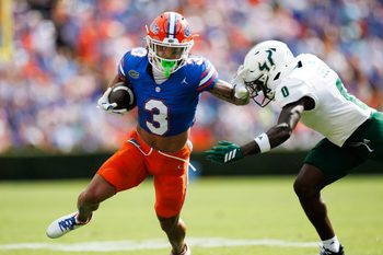 Sep 6, 2025; Gainesville, Florida, USA; Florida Gators wide receiver Eugene Wilson III (3) runs against South Florida Bulls cornerback Jarvis Lee (0) during the first half at Ben Hill Griffin Stadium. Mandatory Credit: Matt Pendleton-Imagn Images
