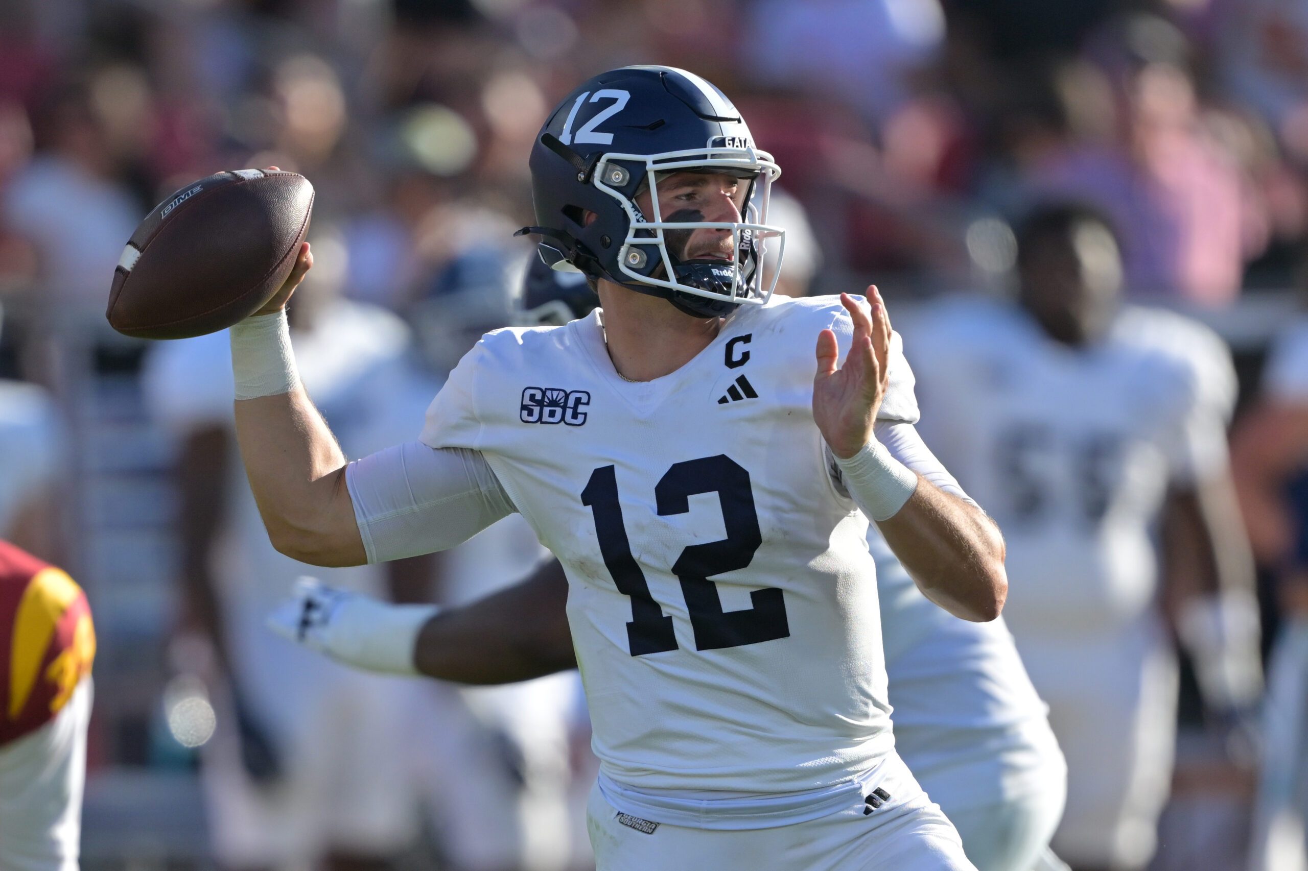 Sep 6, 2025; Los Angeles, California, USA;  Georgia Southern Eagles quarterback JC French IV (12) throws a pass during the first half against the USC Trojans at United Airlines Field at Los Angeles Memorial Coliseum. Mandatory Credit: Jayne Kamin-Oncea-Imagn Images