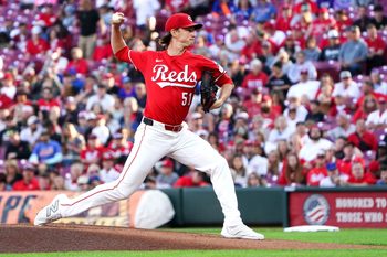 Cincinnati Reds pitcher Brady Singer (51) delivers a pitch in the first inning of a MLB game between the Cincinnati Reds and New York Mets, Saturday, Sept. 6, 2025, at Great American Ball Park in downtown Cincinnati.